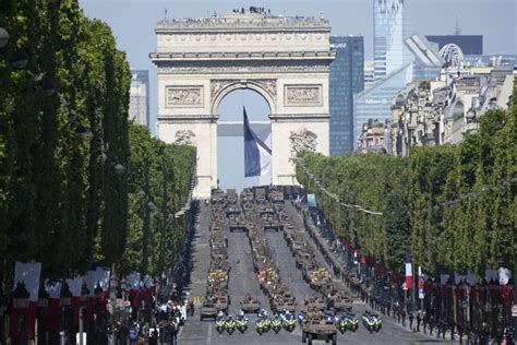 France celebrates Bastille Day with parades and parties – and extra police, after recent unrest